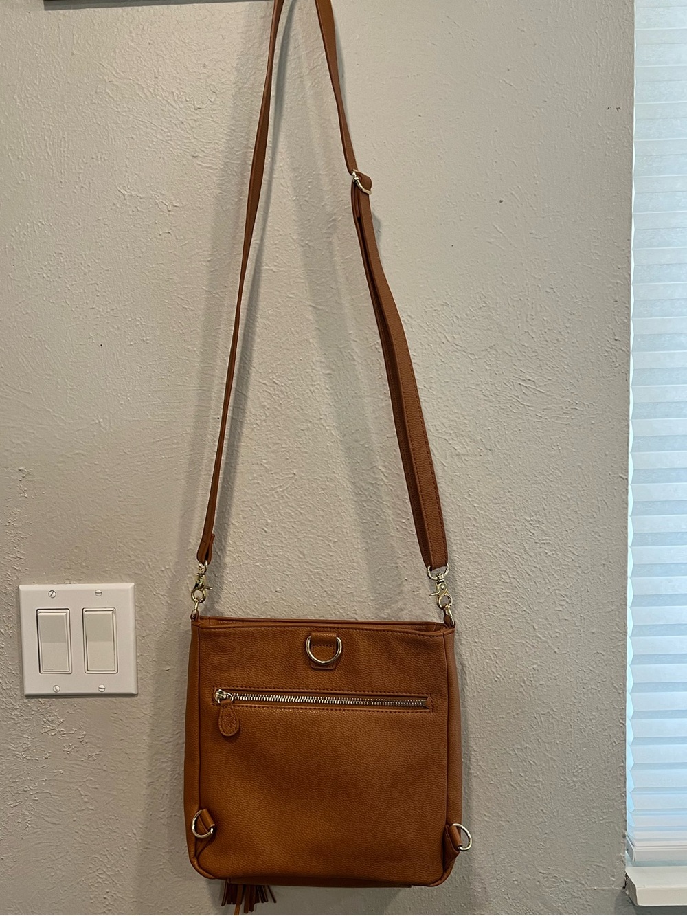 Soft Pebbled Tan Crossbody Bag with Tassel Accent - Picture 3 of 4